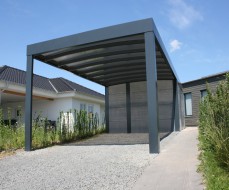 Carport mit Bogendach in Kubusform