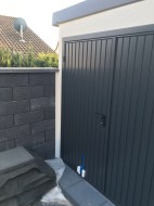 STAHL-Einzelgarage mit Sektionaltor + Geräteraum hinten integriert + Carport-Anbau vorne - BRANDL