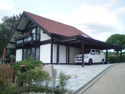 Einzel-Carport aus Holz mit Flachdach und Holzblende für VW-Bus-Transporter (Kastenwagen) - BRANDL