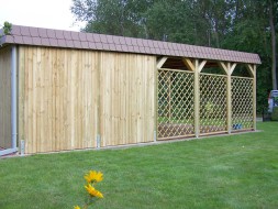 Doppel-Carport aus Holz für Wohnmobil (Wohnwagen) + Abstellkammer (Geräteraum/Schuppen) + Schindelblende in braun - BRANDL