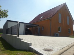 STAHL-Einzelgarage mit Schwingtor + Carport-Anbau - BRANDL