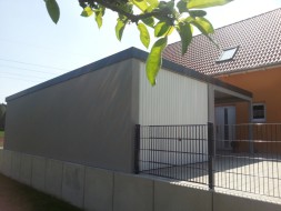 STAHL-Einzelgarage mit Schwingtor + Carport-Anbau - BRANDL