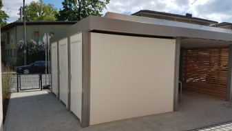 Carport-Reihenanlage mit Mülltonneneinhausung (Geräteraum) und Fahrradraum integriert - BRANDL