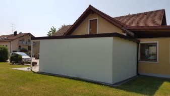 Einzelgarage aus Stahl mit Schwingtor + Anbau-Carport davor (Vordach) - BRANDL