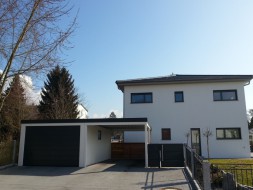 STAHL-Einzelgarage mit Sektionaltor und Anbau-Carport seitlich - BRANDL