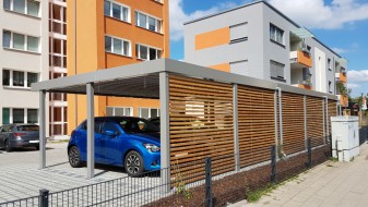 Carport-Reihenanlage mit Mülltonneneinhausung (Geräteraum) und Fahrradraum integriert - BRANDL