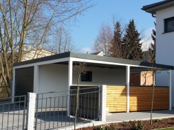 STAHL-Einzelgarage mit Sektionaltor und Anbau-Carport seitlich - BRANDL