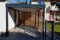 Einzel-Carport aus Stahl mit Wandelementen Holzlattung - BRANDL