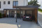 Einzel-Carport aus Stahl mit Hauseingangsüberdachung - BRANDL