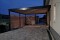 Doppel-Carport aus Stahl + Geräteraum + Sichtschutzwand - BRANDL