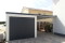 Einzelgarage mit Sektionaltor und Anbau-Carport - BRANDL