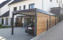 Einzel-Carport aus Stahl mit Hauseingangsüberdachung - BRANDL