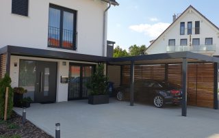 Einzel-Carport aus Stahl mit Hauseingangsüberdachung - BRANDL